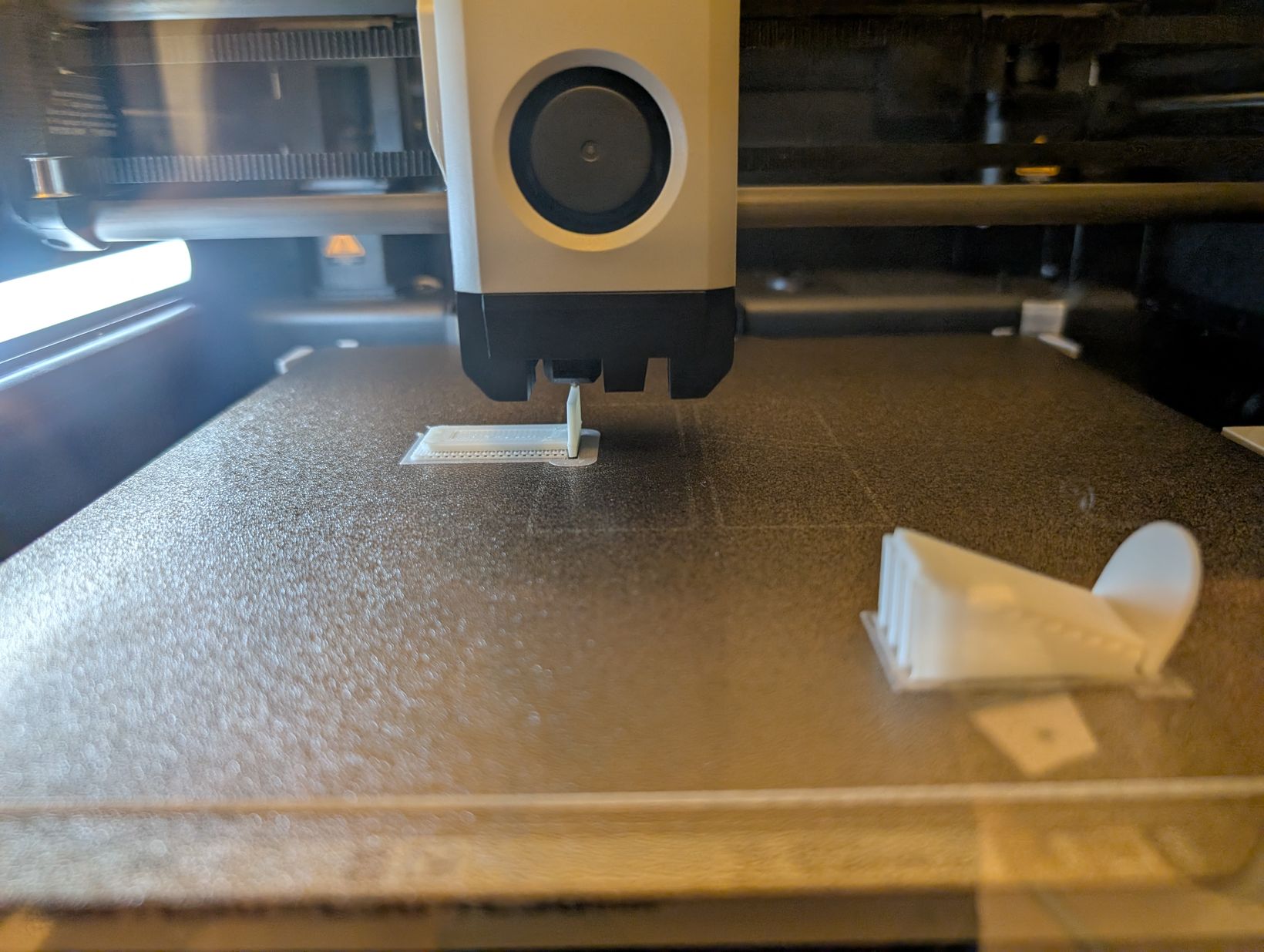 The print in progress on the Bambu Lab P1S 3D printer